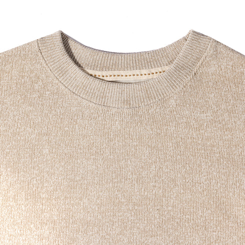 Close-up of a latter sweater with a focus on the neckline.